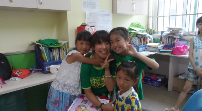 Happy Chinese teacher and students