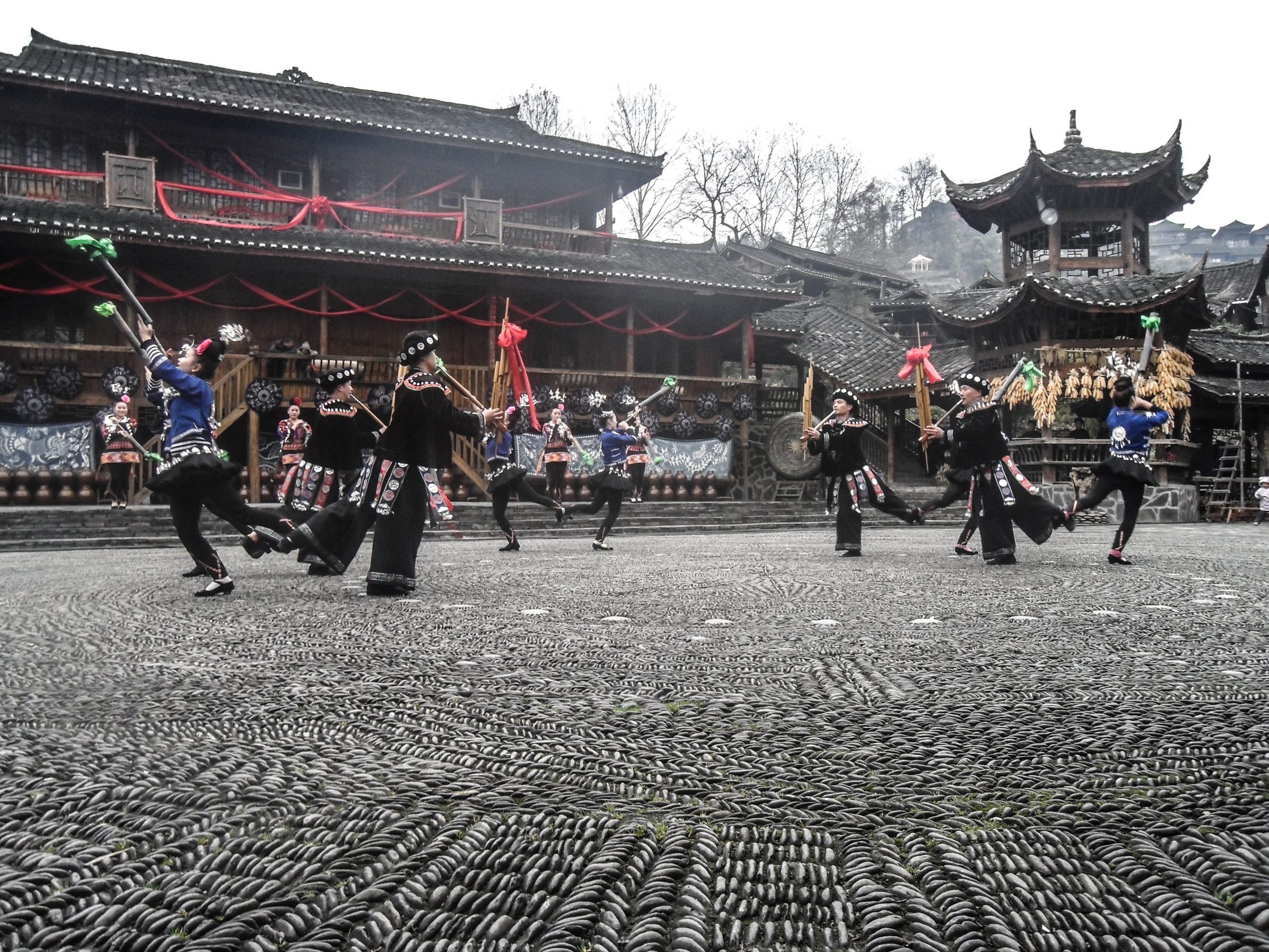 Traditional Miao people dance in Xijiang miao village