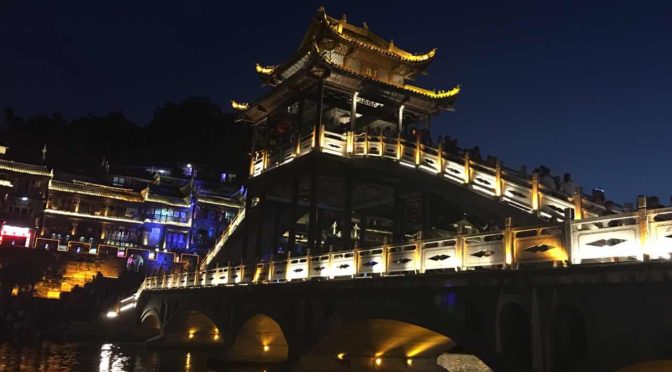 Pagoda at night in Fenghuang ancient town.