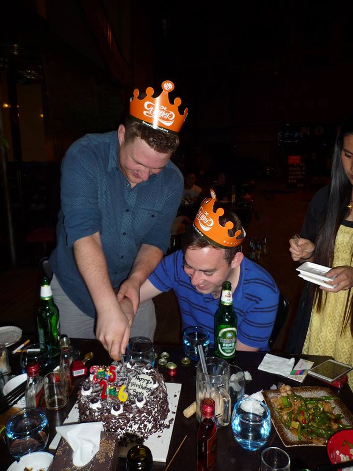 Cutting a birthday cake in Chengdu, China. TEFL review