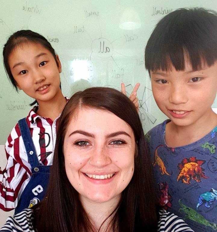 Me with 2 of my students at i2 education Guizhou China