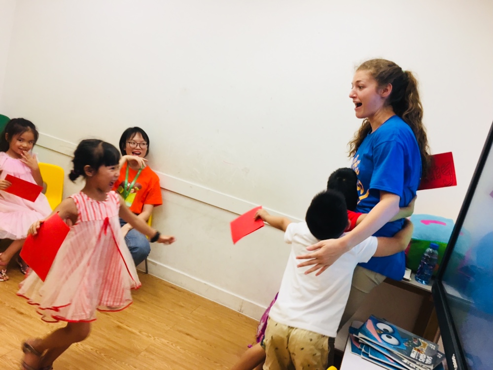 Britanny with her students in class