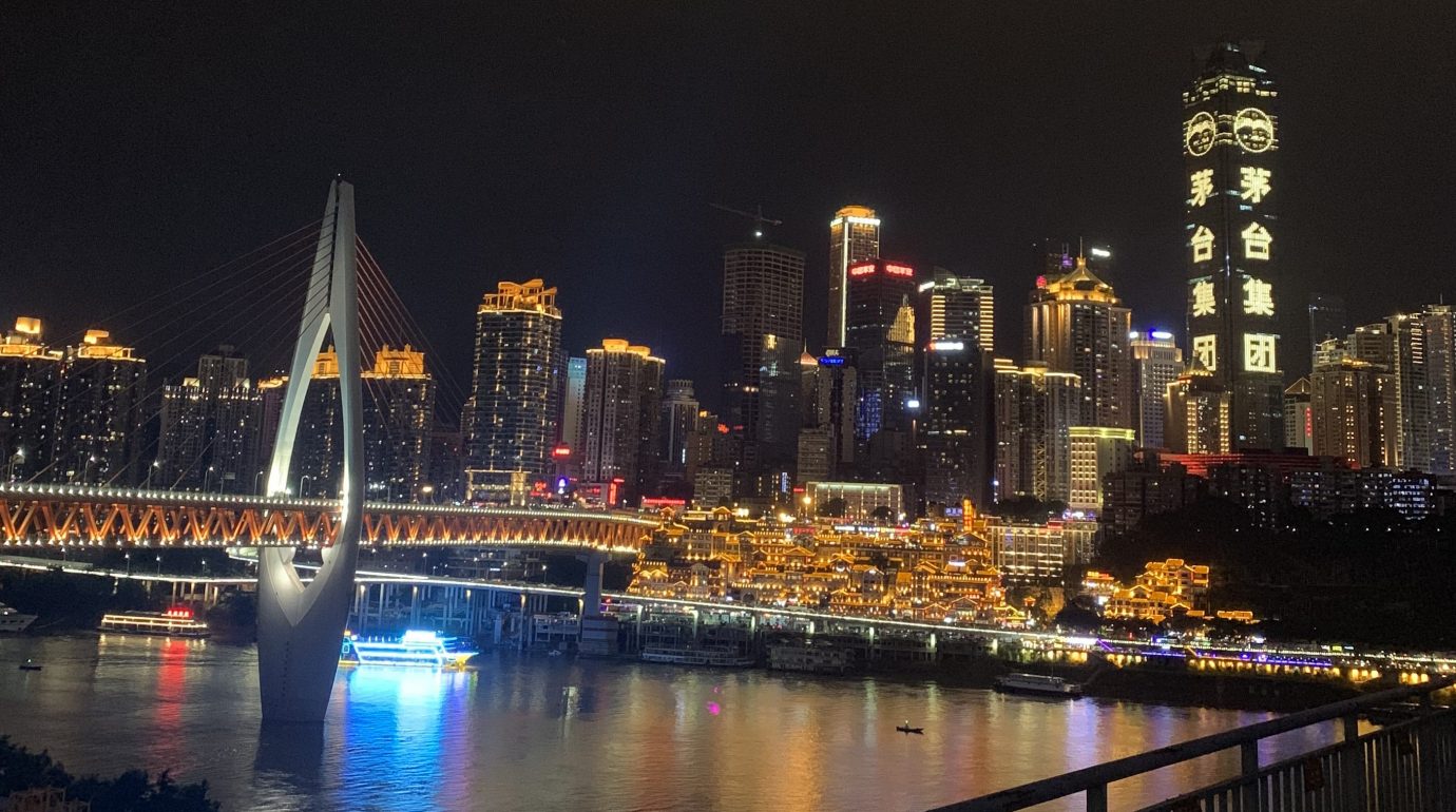 Skyline of Chongqing city at night with the bridge