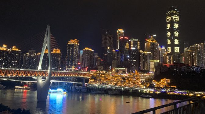Skyline of Chongqing city at night with the bridge