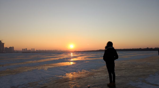 Standing on the frozen Songhua river in Harbin